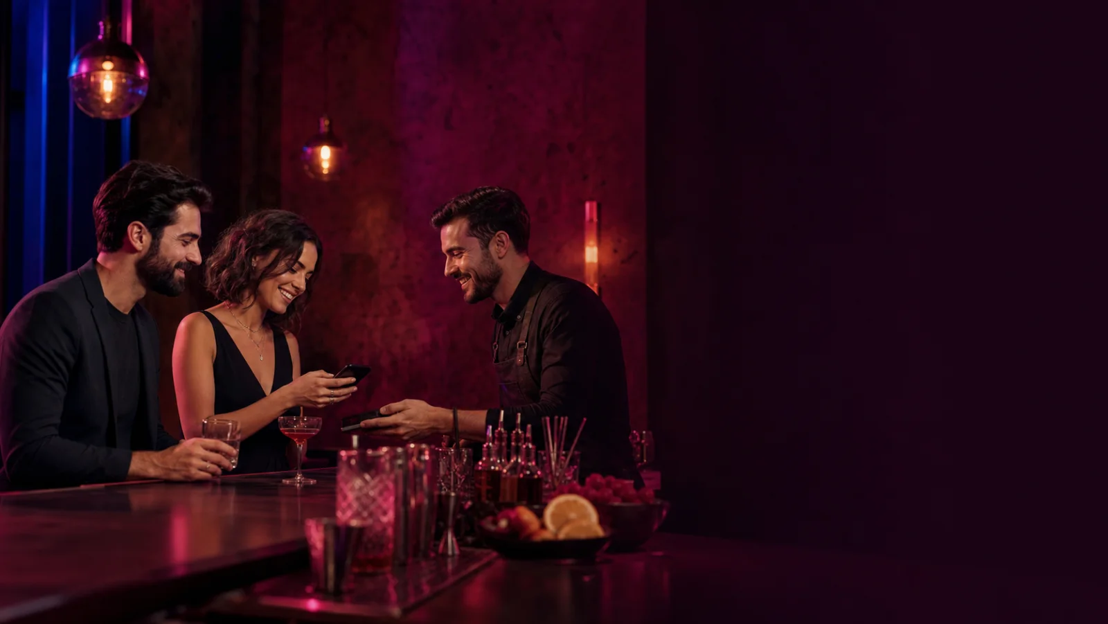Friends using a digital loyalty experience in a cocktail bar